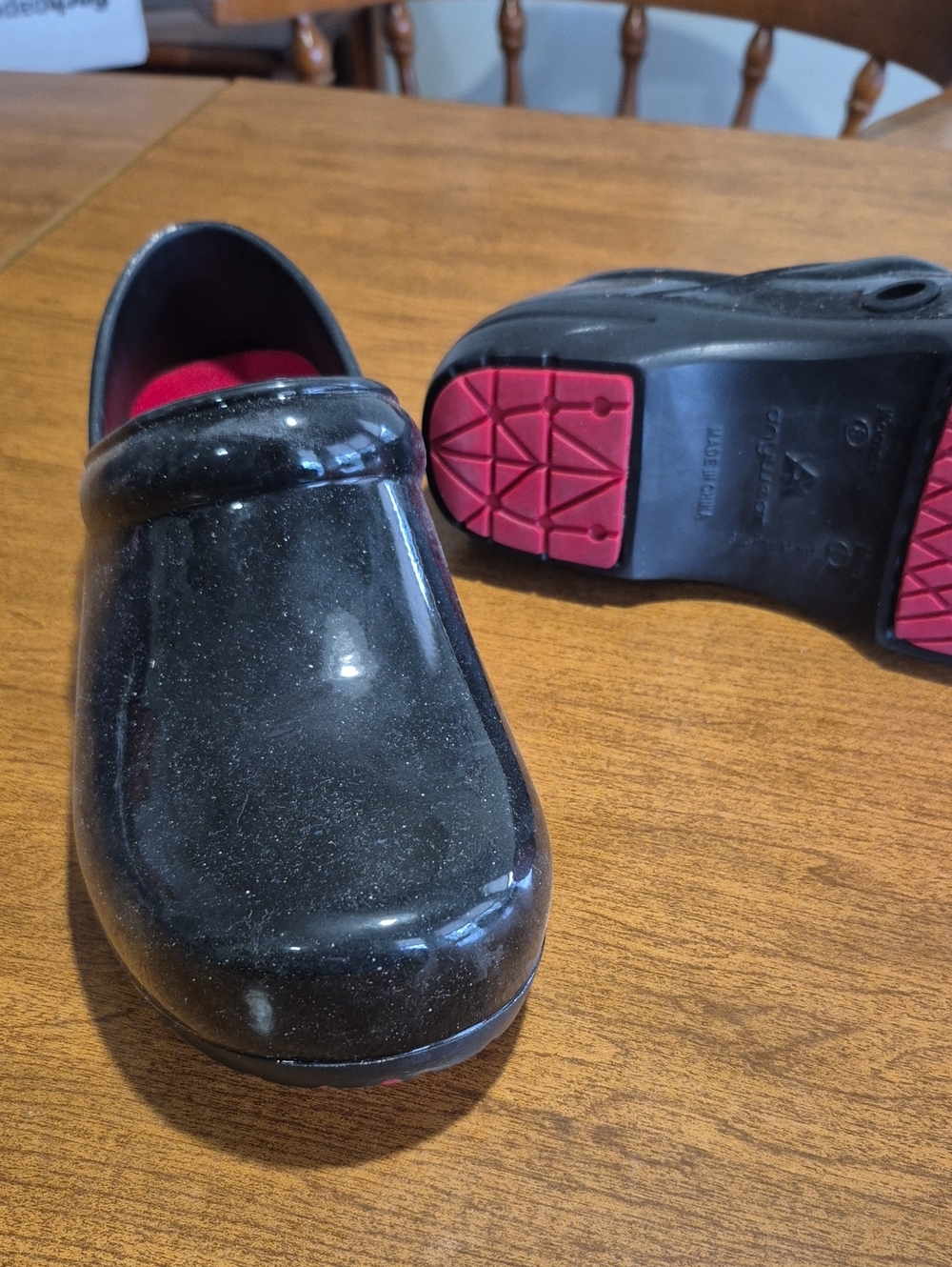 Women's Black Slip-On Rain Clogs with Red Soles